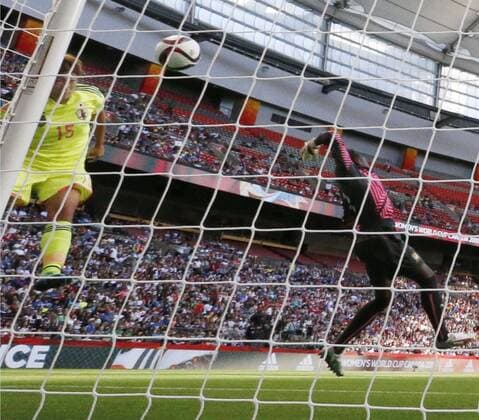 Soccer: Japan see off Cameroon to advance to round of 16 at Women s World Cup Yuika Sugasawa (L) puts Japan 2-0 up with a header past Cameroon goalkeeper Annette Ngo Ndom in a Women s World Cup Group C match in Vancouver, Canada, on June 12, 2015. Japan won 2-1 to secure a place in the round of 16. 