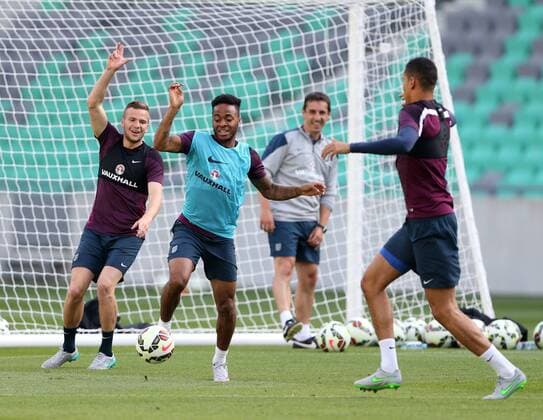 England s Raheem Sterling and Chris Smalling in action during training England Training & press conference PK Pressekonferenz Stozice Stadium - Slovenia - 13th June 2015 - Picture David Klein Sportimage EDITORIAL USE ONLY. No use with unauthorised audio, video, data, fixture lists, club league logos or live services. Online in-match use limited to 120 images, no video emulation. No use in betting, games or single club league player publications.