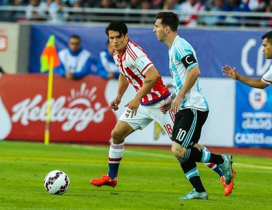 Argentina vs Paraguay LA SERENA, CHILE - 13 06 2015: ARGENTINA X PARAGUAY - Lionel Messi (ARG, R) - Nelson Valdez (L) during match between Argentina and Paraguay in La Portada Stadium in La Serena, Chile, Group B (Photo: Carlos Ezequiel Vannoni FotoArena)  CarlosxEzequielxVannoni