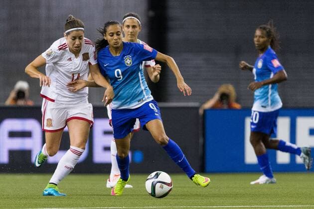 June 13, 2015 : Spain forward Vicky Losada 14 and Brazil midfielder Andressa Alves 9 fight for the ball during the 2015 FIFA Women s World Cup Group E match between Brazil and Spain at the Olympic Stadium in Montreal, Quebec, Canada. SOCCER: JUN 13 FIFA Women s World Cup - Group E - Brazil v Spain Icon15061306 EDITORIAL USE ONLY