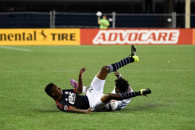 June 13, 2015 - Foxborough, Massachusetts, U.S. - New England Revolution defender London Woodberry (28) and Chicago Fire forward Kennedy Igboananike (77) collide on the pitch during the MLS Fussball Herren USA game between Chicago Fire and the New England Revolution held at Gillette Stadium in Foxborough Massachusetts. The Revolution defeated the Fire 2-0. Eric Canha CSM MLS 2015: Fire vs Revolution JUN 13 - ZUMAc04_