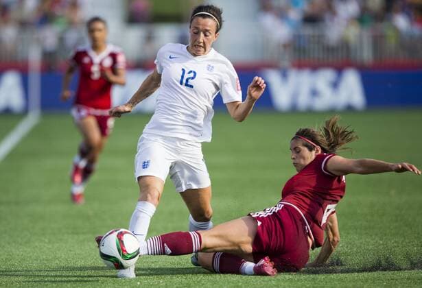 (150613) -- MONCTON, June 13, 2015 -- Lucy Bronze(C) of England vies with Alina Garciamendez(R) of Mexico during their group F match at the 2015 FIFA Women s World Cup in Moncton, Canada, June 13, 2015. England won 2-1. ) (SP)CANADA-MONCTON-FIFA WOMEN S WORLD CUP-GROUP F-ENGLAND VS MEXICO ZouxZheng 