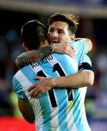 (150614) -- LA SERENA, June 14, 2015 -- Argentina Lionel Messi (R) embraces his teammate Sergio Aguero after scoring during their Group B match against Paraguay at Copa America 2015, in La Serena, Chile, on June 13, 2015. The match ended with a 2-2 draw. ) (SP)CHILE-LA SERENA-COPA AMERICA-ARGENTINA VS PARAGUAY AGENCIAxUNO 