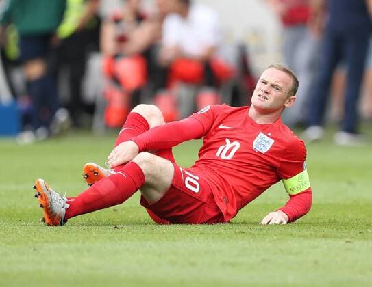 England s Wayne Rooney gets am early knock to his leg Slovenia v England - World Cup 2018 Qualifier- Stozice Stadium - Slovenia - 14th June 2015 - Picture David Klein Sportimage EDITORIAL USE ONLY. No use with unauthorised audio, video, data, fixture lists, club league logos or live services. Online in-match use limited to 120 images, no video emulation. No use in betting, games or single club league player publications.