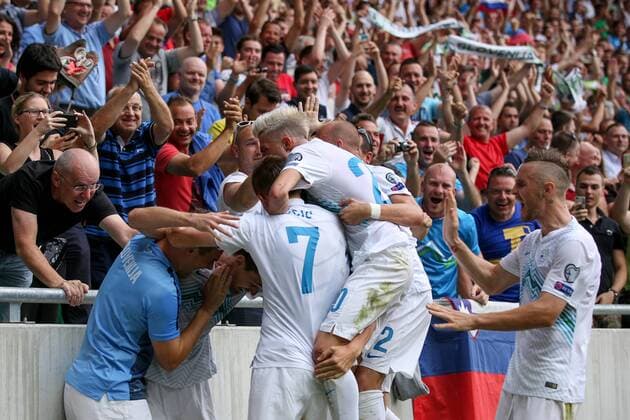 SOCCER - UEFA EURO EM Europameisterschaft Fussball 2016 quali, SLO vs ENG LJUBLJANA,SLOVENIA,14.JUN.15 - SOCCER - UEFA European Championship EM Europameisterschaft 2016, European Qualifiers, international match Länderspiel Slovenia vs England. Image shows the rejoicing of SLO with Milivoje Novakovic and Kevin Kampl (SLO). GEPAxpictures xMaticxKlansek