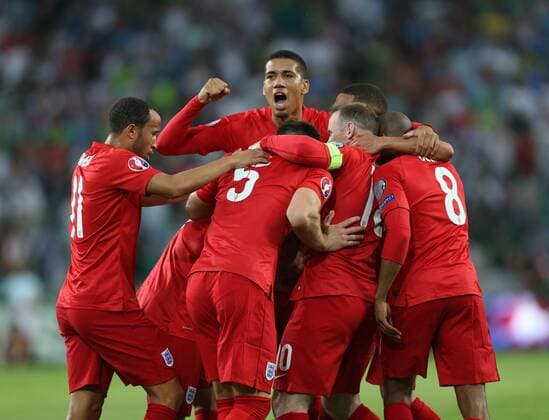 England s Jack Wilshere celebrates scoring his sides opening goal with Chris Smalling Slovenia v England - World Cup 2018 Qualifier- Stozice Stadium - Slovenia - 14th June 2015 - Picture David Klein Sportimage EDITORIAL USE ONLY. No use with unauthorised audio, video, data, fixture lists, club league logos or live services. Online in-match use limited to 120 images, no video emulation. No use in betting, games or single club league player publications.
