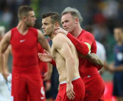 England s Jack Wilshere celebrates at the final whistle with Wayne Rooney Slovenia v England - World Cup 2018 Qualifier- Stozice Stadium - Slovenia - 14th June 2015 - Picture David Klein Sportimage EDITORIAL USE ONLY. No use with unauthorised audio, video, data, fixture lists, club league logos or live services. Online in-match use limited to 120 images, no video emulation. No use in betting, games or single club league player publications.