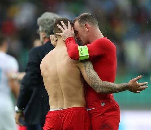 England s Jack Wilshere celebrates at the final whistle with Wayne Rooney Slovenia v England - World Cup 2018 Qualifier- Stozice Stadium - Slovenia - 14th June 2015 - Picture David Klein Sportimage EDITORIAL USE ONLY. No use with unauthorised audio, video, data, fixture lists, club league logos or live services. Online in-match use limited to 120 images, no video emulation. No use in betting, games or single club league player publications.