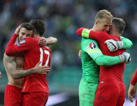 England s Joe Hart celebrates with Wayne Rooney at the final whistle Slovenia v England - World Cup 2018 Qualifier- Stozice Stadium - Slovenia - 14th June 2015 - Picture David Klein Sportimage EDITORIAL USE ONLY. No use with unauthorised audio, video, data, fixture lists, club league logos or live services. Online in-match use limited to 120 images, no video emulation. No use in betting, games or single club league player publications.