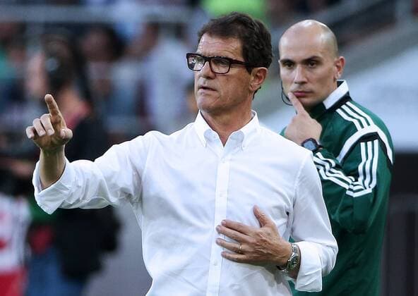 MOSCOW, RUSSIA. JUNE 14, 2015. Russian national football team head coach Fabio Capello (L) seen in the 2016 UEFA European Championship EM Europameisterschaft Qualifying Round Group G football match against Austria at the Otkrytie Arena Stadium. The Austrian team won the game 1:0. Valery Sharifulin TASS  TS005CC8