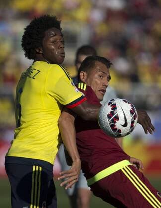 (150615) -- RANCAGUA, June 14, 2015 -- Colombia s Carlos Sanchez (L) vies with Venezuela s Juan Arango during a Group C match between Colombia and Venezuela at Copa America 2015 in Rancagua, Chile, June 14, 2015. Colombia lost the match 0-1.) (SP)CHILE-RANCAGUA-COPA AMERICA 2015-GROUP C-COLOMBIA VS VENEZUELA GuillermoxArias 