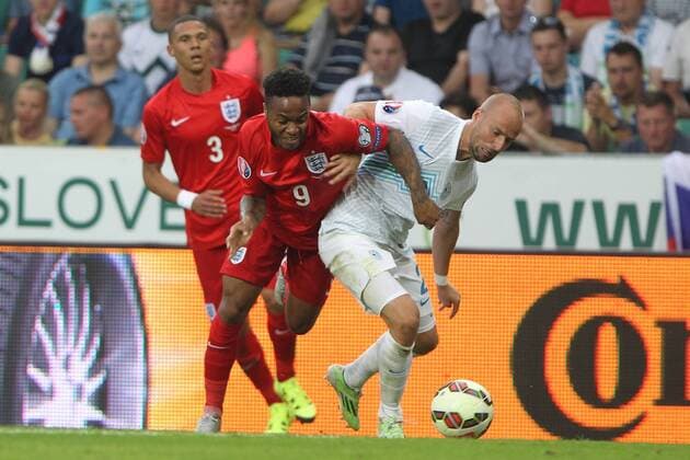 June 14, 2015 - Ljubljana, Slovenia - SLOVENIA, LJUBLJANA JUNE 14: Slovenian Miso Brecko and England forward Raheem Sterling UEFA EURO EM Europameisterschaft Fussball 2016 Group E qualifier between Slovenia and England at park Stozice, Slovenia on June 14, 2015. Slovenia England UEFA EURO 2016 Qualifier Group E  - ZUMAn230