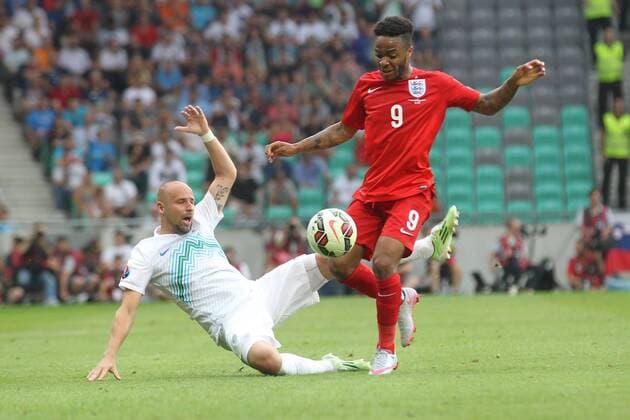 June 14, 2015 - Ljubljana, Slovenia - SLOVENIA, LJUBLJANA JUNE 14: Slovenian Miso Brecko and England forward Raheem Sterling UEFA EURO EM Europameisterschaft Fussball 2016 Group E qualifier between Slovenia and England at park Stozice, Slovenia on June 14, 2015. Slovenia England UEFA EURO 2016 Qualifier Group E  - ZUMAn230