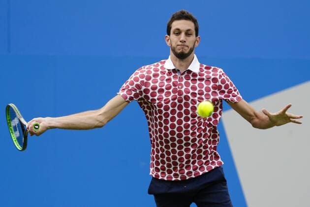 15.06.2015. London, England. Queens Aegon Championship Tennis. James Ward (GBR) versus Milos Raonic (CAN), 1st round match. James Ward in action xCraigxMercerx  ActionPlus11631734
