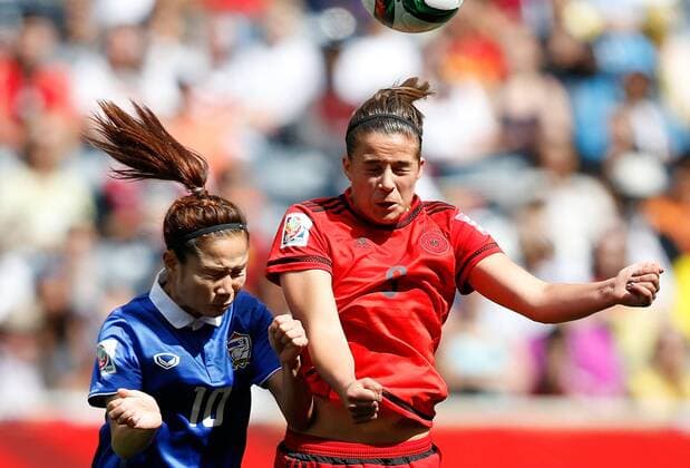 (150615) -- WINNIPEG, June 15, 2015 -- Lena Lotzen of Germany vies with Sunisa Srangthaisong of Thailand during the Group B match between Germany and Thailand at Winnipeg Stadium in Winnipeg, Canada on June 15, 2015. Germany won 4-0. ) (SP)CANADA-WINNIPEG-FIFA WOMEN S WORLD CUP-GER VS THA WangxLili 