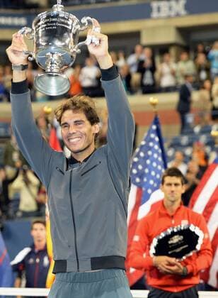 NEW YORK, United States - Rafael Nadal of Spain raises his trophy after defeating Novak Djokovic (R) of Serbia in the men s singles final of the U.S. Open tennis tournament in New York on Sept. 9, 2013. Nadal captured his second U.S. Open title with a 6-2, 3-6, 6-4, 6-1 victory.  0910027