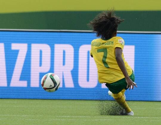 16 JUNE 2015: Cameroon s Gabrielle Onguene (7) kicks the ball and scores the first goal against Switzerland at the FIFA Womens World Cup at Commonwealth Stadium in Edmonton, Alberta, Canada. SOCCER: JUN 16 FIFA Women s World Cup - Group C - Switzerland v Cameroon Icon20150611006 EDITORIAL USE ONLY