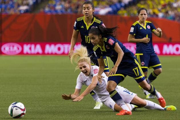 June 17, 2015 : England defender Alex Greenwood 14 reacts as she falls on the ground while fighting for the ball against Colombia midfielder Carolina Arias 17 during the 2015 FIFA Women s World Cup Group F match between England and Colombia at the Olympic Stadium in Montreal, Quebec, Canada. SOCCER: JUN 17 FIFA Women s World Cup - Group F - England v Colombia Icon15061711 EDITORIAL USE ONLY