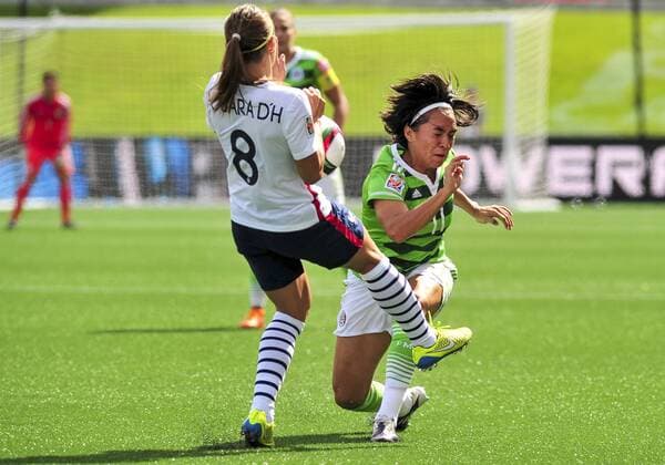 June 17, 2015: Jessica Houara ( 8) of France and Monica Ocampo ( 11) of Mexico battle for the ball during the FIFA 2015 Women s World Cup Group F match between Mexico and France at Lansdowne Stadium in Ottawa, Canada. SOCCER: JUN 17 FIFA Women s World Cup - Group F - Mexico v France Icon15061700006 EDITORIAL USE ONLY