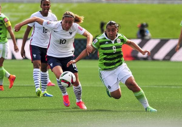 June 17, 2015: Camile Abily ( 10) of France and Forward Charlene Corral ( 9) of Mexico battle for the ball during the FIFA 2015 Women s World Cup Group F match between Mexico and France at Lansdowne Stadium in Ottawa, Canada. SOCCER: JUN 17 FIFA Women s World Cup - Group F - Mexico v France Icon15061700007 EDITORIAL USE ONLY