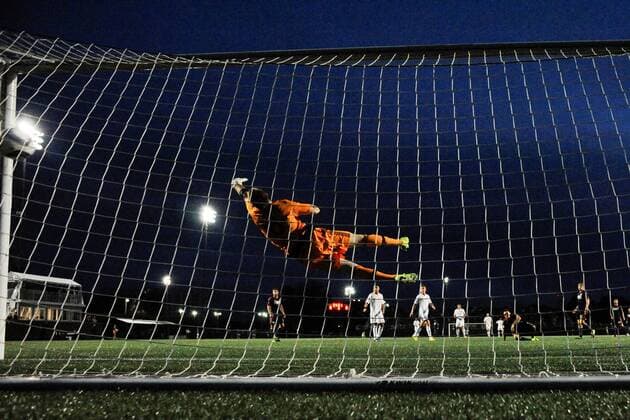June 17, 2015 - Boston, Massachusetts, U.S. - New England Revolution goalkeeper Brad Knighton (18) fails to stop the ball from finding the back of the net during the US Open Cup fourth round between the New England Revolution and the Charlotte Independence held at Harvard s Soldiers Field Soccer Stadium. The Independence defeated the Revolution 1-0. Eric Canha CSM Soccer 2015: US Open Cup Independence vs Revolution JUN 17 - ZUMAc04_