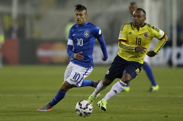 SANTIAGO, June 17, 2015 -- Neymar (L) of Brazil vies for the ball with Juan Zuniga of Colombia during the Group C match of the Copa America Chile 2015, at the Estadio Monumental, in Santiago, Chile, on June 17, 2015. ) (ce) (SP)CHILE-SANTIAGO-COPA AMERICA-BRAZIL VS COLOMBIA JorgexVillegas 