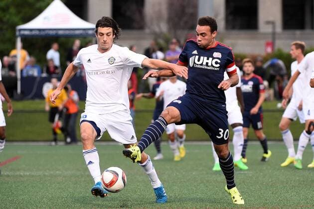 June 17, 2015 - Boston, Massachusetts, U.S. - New England Revolution defender Kevin Alston (30) and Charlotte Independence midfielder Paolo DelPiccolo (36) battle for control of the ball during the US Open Cup fourth round between the New England Revolution and the Charlotte Independence held at Harvard s Soldiers Field Soccer Stadium. The Independence defeated the Revolution 1-0. Eric Canha CSM Soccer 2015: US Open Cup Independence vs Revolution JUN 17 - ZUMAc04_