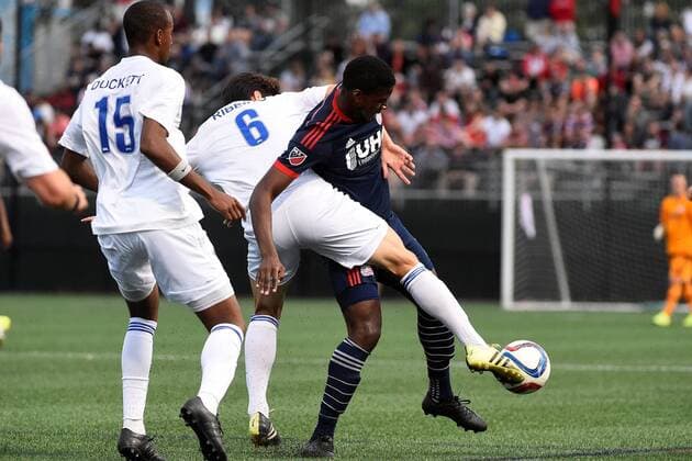 June 17, 2015 - Boston, Massachusetts, U.S. - Charlotte Independence defender Andrew Ribeiro (6) wraps up New England Revolution s Sean Okoli (7) and kicks the ball away during the US Open Cup fourth round between the New England Revolution and the Charlotte Independence held at Harvard s Soldiers Field Soccer Stadium. The Independence defeated the Revolution 1-0. Eric Canha CSM Soccer 2015: US Open Cup Independence vs Revolution JUN 17 - ZUMAc04_