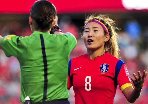 June 17, 2015: Midfielder Cho Sohyun ( 8) of Korea Republic questions a call by the official during the FIFA 2015 Women s World Cup Group E match between Korea and Spain at Lansdowne Stadium in Ottawa, Canada. Korea recovered from a 1-0 deficit at half time to win 2-1 and progress to the knockout stages. SOCCER: JUN 17 FIFA Women s World Cup - Group E - Korea v Spain Icon15061700019 EDITORIAL USE ONLY