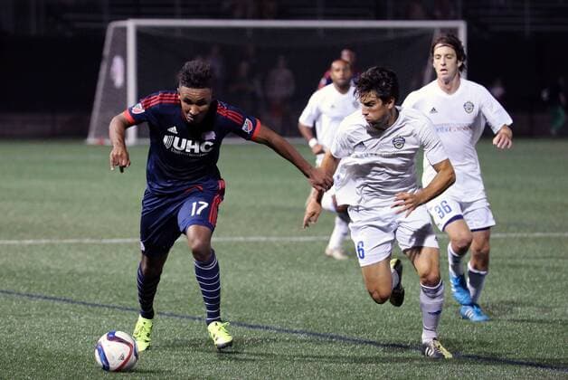 June 17, 2015: New England Revolution forward Juan Agudelo (17) tries to escape from Charlotte Independence defender Andrew Ribeiro (6). The Charlotte Independence defeated the New England Revolution MLS Fussball Herren USA 1-0 in a fourth round Lamar Hunt US Open Cup match at Harvard s Soldiers Field Soccer Stadium SOCCER: JUN 17 US Open Cup - Fourth Round - Charlotte Independence at Revolution Icon482150617034 EDITORIAL USE ONLY