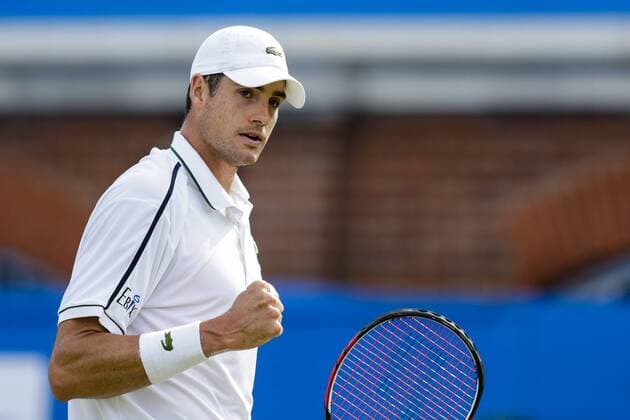 18.06.2015. London, England. Queens Aegon Championship Tennis. Feliciano Lopez (ESP) versus John Isner (USA), 2nd round match. John Isner celebrates an important point xCraigxMercerx  ActionPlus11632803