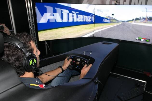 FORMULA 1 - GP of Austria 2015 SPIELBERG,AUSTRIA,18.JUN.15 - MOTORSPORTS, FORMULA 1 - Grand Prix of Austria, Red Bull Ring, preview. Image shows Daniel Ricciardo (AUS Infiniti Red Bull Racing) at the gamezone. GEPAxpictures xHaraldxSteiner