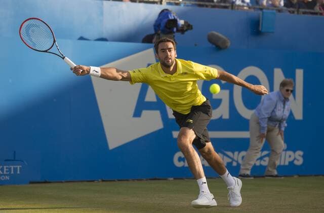 18.06.2015. London, England. Queens Aegon Championship Tennis. Marin Cilic (CRO) stretches for the ball during his match with Viktor Troicki (SRB). xNigelxCookex  ActionPlus11632914