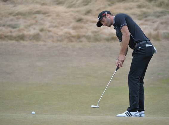 Dustin Johnson putts on the eighth green in round one of the 115th U.S. Open Championship at Chambers Bay on June 18, 2015 in University Place, Washington.  SEA20150618276 KEVINxDIETSCH