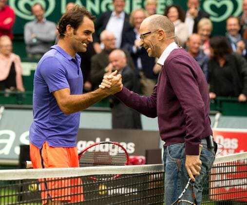 Roger Federer (SUI) und TV Kommentator Matthias Stach, Tennis - Gerry Weber Open - ATP Tennis Herren 500 - Gerry Weber Stadion - Halle Westf. - Nordrhein Westfalen - Germany - 19 June 2015. Juergen Hasenkopf