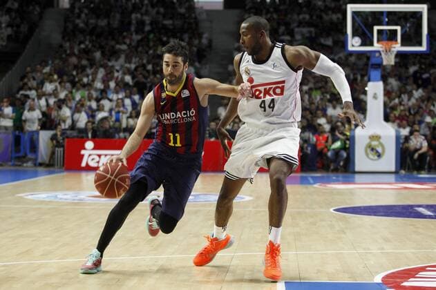 Aktuell Basketball, Spanien, Finale, Real Madrid - FC Barcelona Real Madrid s Slaughter and Barcelona s Navarro during Liga Endesa Final first match at Palacio de los Deportes in Madrid, Spain. June 19, 2015.  (2015061900091)