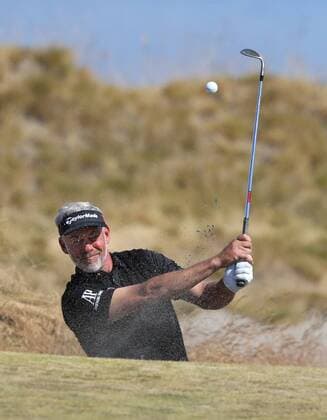 Darren Clarke of Northern Ireland hits out of a trap to the 17th green in the second round of the 115th U.S. Open Championship at Chambers Bay on June 19, 2015 in University Place, Washington.  SEA20150619029 JIMxBRYANT