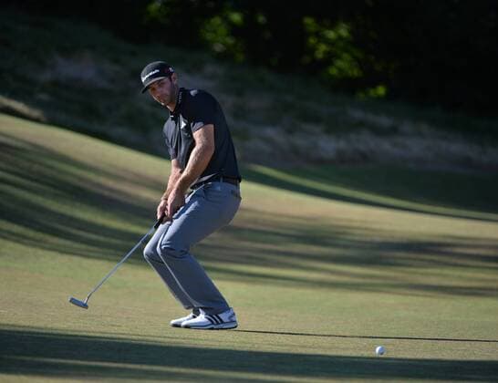 Dustin Johnson putts on the 11th green in the second round of the 115th U.S. Open Championship at Chambers Bay on June 19, 2015 in University Place, Washington.  SEA20150619075 KEVINxDIETSCH