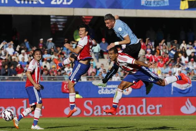 Football , Uruguay v Paraguay Copa America 2015 . Uruguay s Jose Maria Jimenez, right, scores his goal against Paraguay during the match of group B of the 2015 Copa America at La Serena stadium. Rancagua, Chile. 20 06 2015 Marcelo Hernandez Photosport Uruguay v Paraguay, Copa America 2015. 