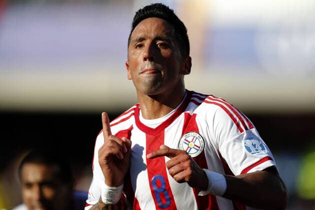 Football , Uruguay v Paraguay. Copa America Championship 2015 . Paraguay s player Lucas Barrios celebrates scoring against Uruguay during the group B football match of the 2015 Copa America at the La Portada stadium in Santiago.. 20 06 2015 Andres Pina Photosport Uruguay v Paraguay, Copa America 2015. 
