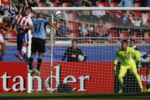 Football , Uruguay v Paraguay Copa America 2015 . Paraguay s Lucas Barrios, right, scores his goal against Uruguay during the match of group B of the 2015 Copa America at La Serena stadium. Rancagua, Chile. 20 06 2015 Marcelo Hernandez Photosport Uruguay v Paraguay, Copa America 2015. 