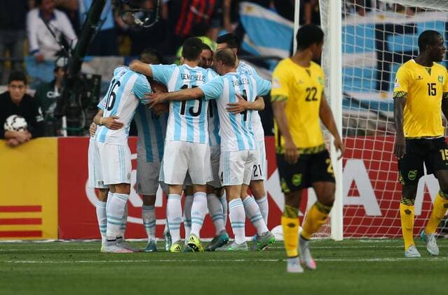 Football , Argentina v Jamaica Copa America 2015 . Argentina s player Gonzalo Higuain celebrates with teammates scoring against Jamaica during the group B of the 2015 Copa America football match held at the Sausalito stadium in Vina del Mar, Chile. 20 06 2015 Jonathan Mancilla Photosport Argentina v Jamaica, Copa America 2015. 