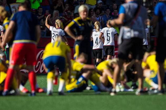 June 20, 2015: Swedish players watch as the German players thank the fans at the FIFA 2015 Women s World Cup Round of 16 match between Germany and Sweden at Lansdowne Stadium in Ottawa, Canada. Germany defeated Sweden 4-1. SOCCER: JUN 20 FIFA Women s World Cup - Round of 16 - Germany v Sweden Icon150620060 EDITORIAL USE ONLY