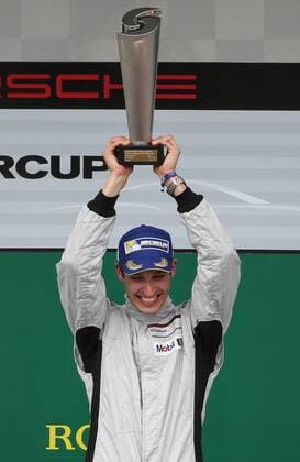 MOTORSPORTS - Porsche Super Cup 2015 SPIELBERG,AUSTRIA,21.JUN.15 - MOTORSPORTS - Porsche Supercup, Red Bull Ring, award ceremony. Image shows the rejoicing of Christopher Zoechling (GER). Keywords: trophy. GEPAxpictures xChristianxWalgram