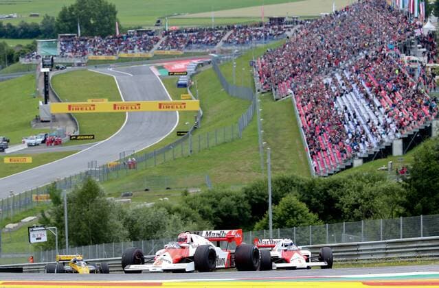 FORMULA 1 - GP of Austria 2015 SPIELBERG,AUSTRIA,21.JUN.15 - MOTORSPORTS, FORMULA 1 - Grand Prix of Austria, Red Bull Ring, legends race. Image shows chairman of the advisory board Niki Lauda (Mercedes GP) in the 1984 McLaren MP 4 2 TAG Turbo and Alain Prost in the 1985 McLaren MP4 2b. GEPAxpictures xChristianxWalgram