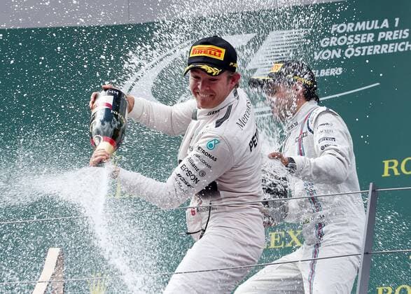 FORMULA 1 - GP of Austria 2015 SPIELBERG,AUSTRIA,21.JUN.15 - MOTORSPORTS, FORMULA 1 - Grand Prix of Austria, Red Bull Ring, award ceremony. Image shows Nico Rosberg (GER Mercedes AMG Petronas F1 Team). Keywords: champagne shower. GEPAxpictures xHansxOberlaender