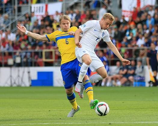 Sweden s Oscar Lewicki tussles with England s Alex Pritchard Sweden v England - UEFA Under 21 s - Andruv Stadium - Czech Republic - 21st June 2015 - Picture David Klein Sportimage EDITORIAL USE ONLY. No use with unauthorised audio, video, data, fixture lists, club league logos or live services. Online in-match use limited to 120 images, no video emulation. No use in betting, games or single club league player publications.