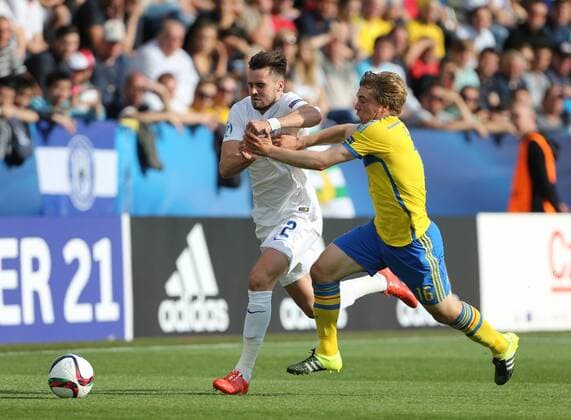 Sweden s Simon Tibbling tussles with England s Carl Jenkinson Sweden v England - UEFA Under 21 s - Andruv Stadium - Czech Republic - 21st June 2015 - Picture David Klein Sportimage EDITORIAL USE ONLY. No use with unauthorised audio, video, data, fixture lists, club league logos or live services. Online in-match use limited to 120 images, no video emulation. No use in betting, games or single club league player publications.