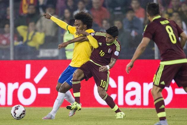 Brazil vs Venezuela SANTIAGO, CHILE - 06 21 2015: BRAZIL X VENEZUELA - William the Brazil dispute ball R. Vargas of Venezuela during the match between Brazil vs Venezuela, valid for the third round of the first phase of Group C of the Copa America 2015, held at the Estadio Monumental David Arellano. (Photo: Marcelo Machado de Melo FotoArena)  MarceloxMachadoxdexMelo