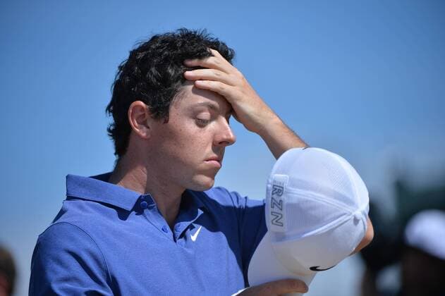 Rory McIlroy wipes his forehead as he walks to the 16th tee during the fourth round of the 115th U.S. Open Championship at Chambers Bay on June 21, 2015 in University Place, Washington.  SEA2015062122 KEVINxDIETSCH